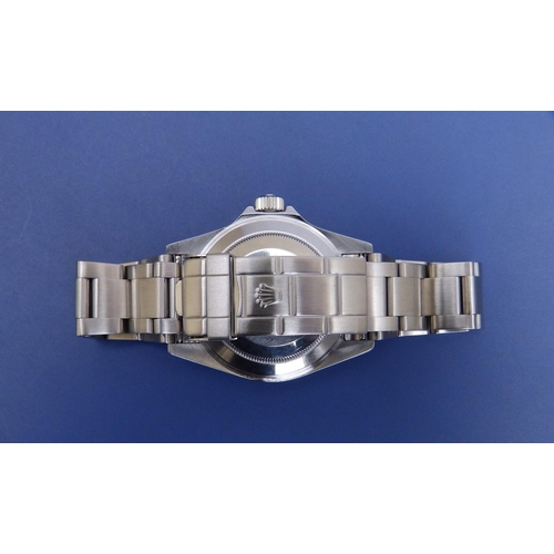 121 - A 2002  gent's stainless steel Rolex Submariner Oyster Perpetual Date wrist watch, the black dial wi... 