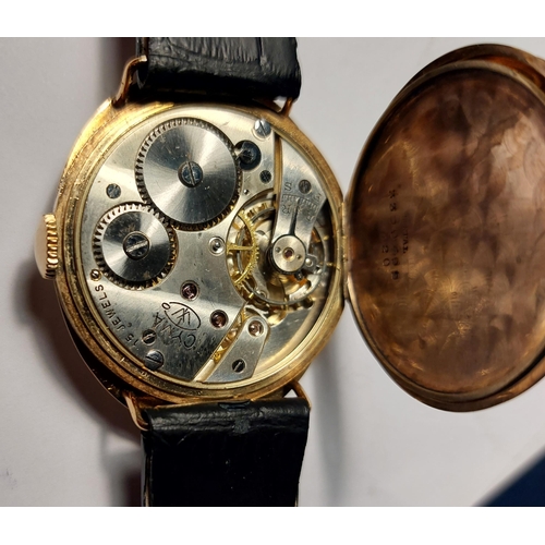 126 - An early 20thC gent's 14ct gold Cyma wrist watch, the white dial  with Arabic numerals, subsidiary s... 