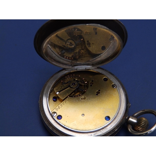 132 - A silver half hunter cased  presentation pocket watch,  50mm diameter and a (damaged)  trench style ... 