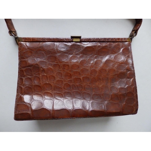 40 - A Fassbender brown crocodile  leather handbag, 9.75