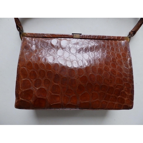 40 - A Fassbender brown crocodile  leather handbag, 9.75