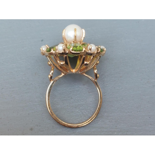 158 - A large peridot & pearl set 9ct gold cluster ring.  Finger size O.