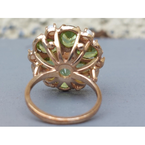 158 - A large peridot & pearl set 9ct gold cluster ring.  Finger size O.