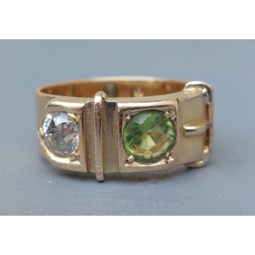 159 - A diamond & green stone set 18ct gold buckle band ring - London marks 1951.  Finger size N/O.