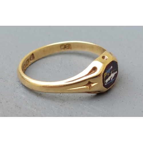 163 - A late Georgian 18ct gold signet style ring, set with a small octagonal red stone decorated with ena... 