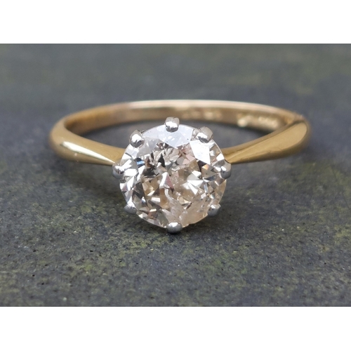 165 - A diamond solitaire ring, the claw set brilliant weighing in excess of one carat, on '18ct' shank.  ... 