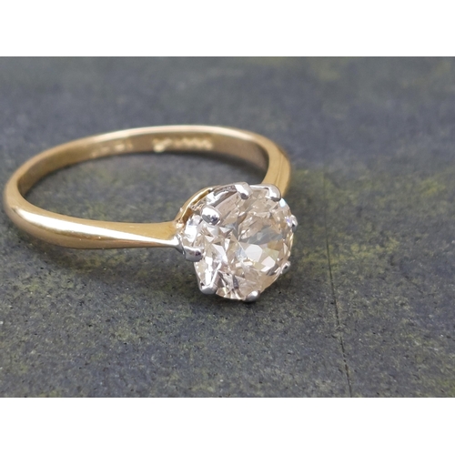 165 - A diamond solitaire ring, the claw set brilliant weighing in excess of one carat, on '18ct' shank.  ... 