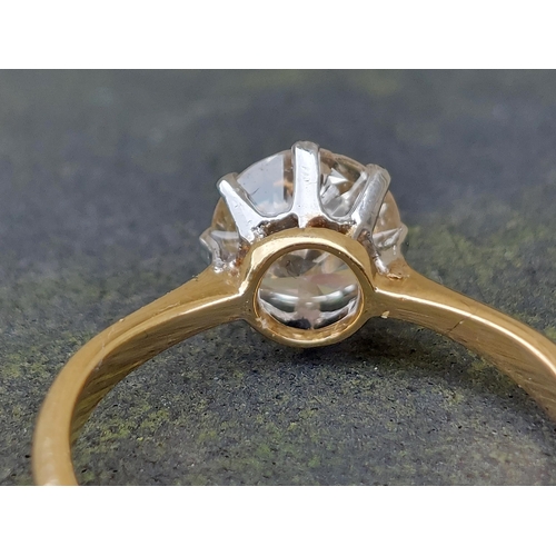 165 - A diamond solitaire ring, the claw set brilliant weighing in excess of one carat, on '18ct' shank.  ... 