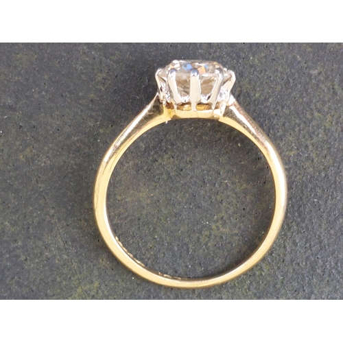 165 - A diamond solitaire ring, the claw set brilliant weighing in excess of one carat, on '18ct' shank.  ... 