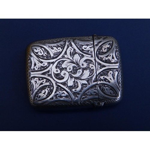 108a - A Birmingham silver vesta in the Irish taste, decorated with a green stone harp and engraved shamroc... 