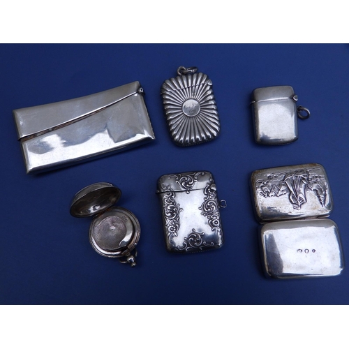 108c - Two Birmingham silver vestas, a silver sovereign case, silver card case and one other. (5)