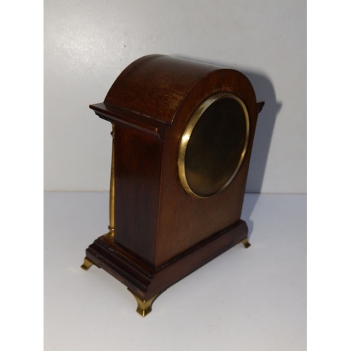 62 - A small Edwardian inlaid mahogany mantel clock.