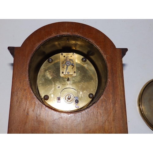 62 - A small Edwardian inlaid mahogany mantel clock.