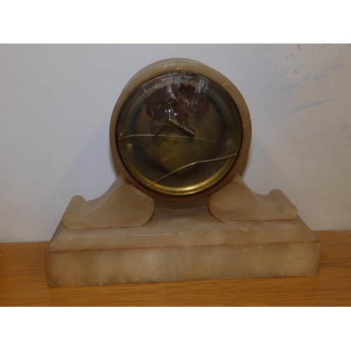 87b - A 19thC white onyx mantel clock, 9