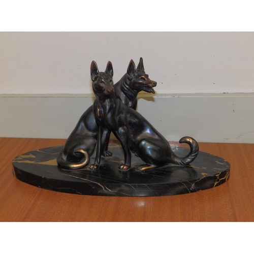 91 - A French art deco bronzed metal dog group depicting two alsatians.