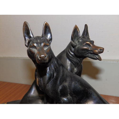 91 - A French art deco bronzed metal dog group depicting two alsatians.