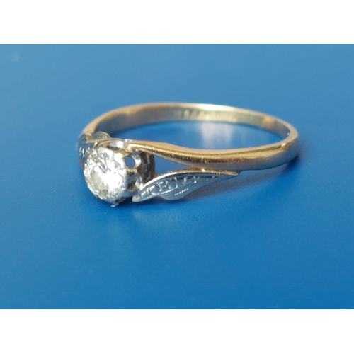 143 - A diamond solitaire ring and three 9ct rings. (4)