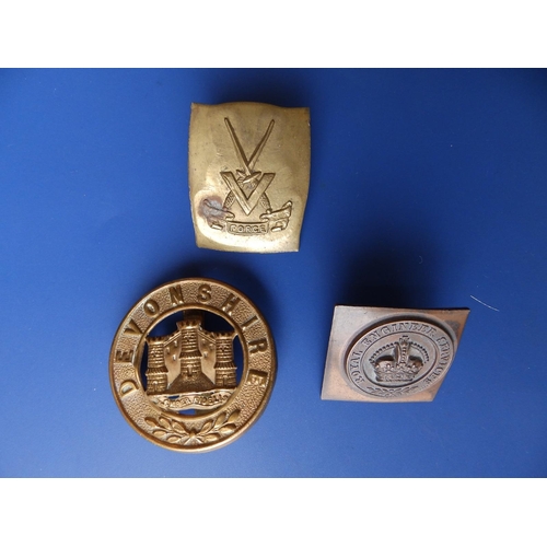 89 - A WWII V Force badge and two others. (3)