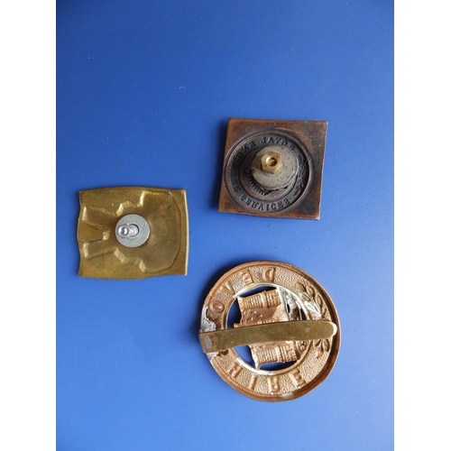 89 - A WWII V Force badge and two others. (3)