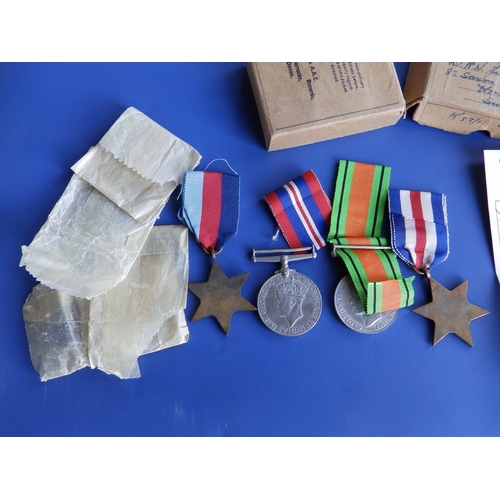 91 - Four WWII medals with box of issue and certficate awarded to Lance Corporal R. W. Jupp of Horsham, t... 