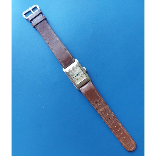 A gent's stainless steel Jaeger LeCoultre tank watch with centre ...