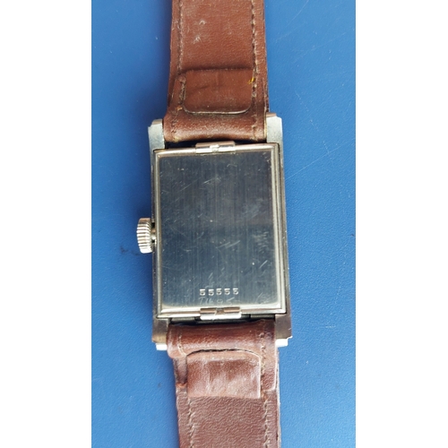 A gent's stainless steel Jaeger LeCoultre tank watch with centre ...