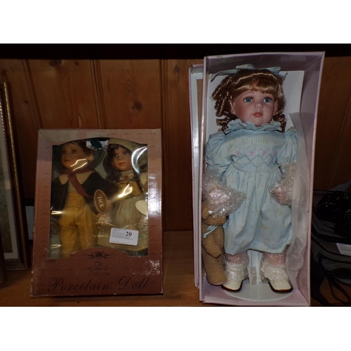 20 - BOXED PORCELAIN DOLLS