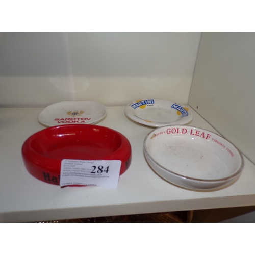 284 - 4 ADVERTISING ASH TRAYS