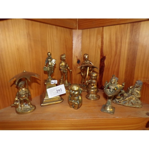 292 - SHELF - HEAVY BRASS ORNAMENTS