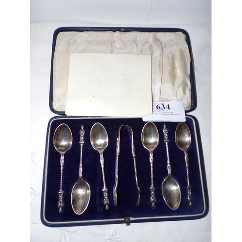 634 - CASED SET SILVER APOSTLE TEASPOONS & SUGAR NIPS SHEFFIELD 1923