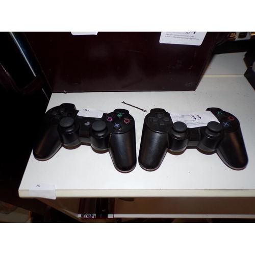 33 - PLAYSTATION CONTROLLERS*