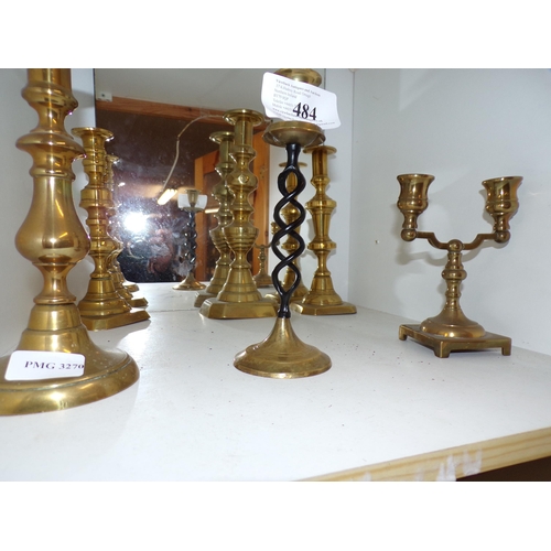 484 - SHELF - ALL BRASS CANDLESTICKS