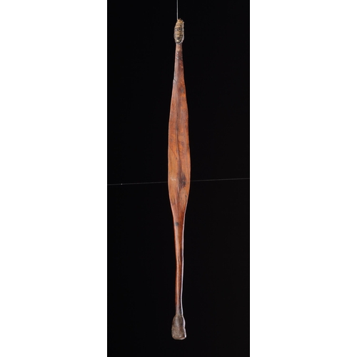 603 - AN ABORIGINAL SPEAR THROWER AUSTRALIA, 19TH CENTURY Wood, gum, tooth or claw, modern stand thrower 6... 