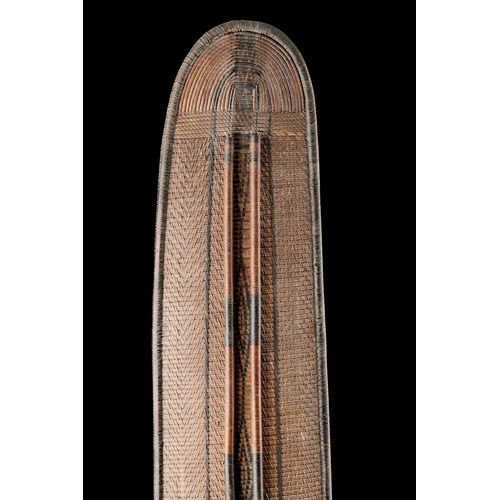 611 - A CENTRAL AFRICAN MONGO SAKA PEOPLES LONG OVAL WICKERWORKED SHIELD DEMOCRATIC REPUBLIC OF CONGO, LAT... 