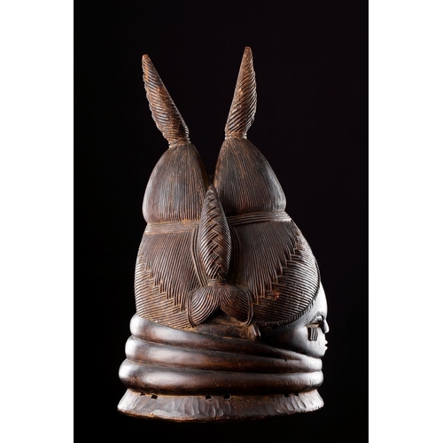 615 - AN AFRICAN 'SANDE' OR 'BUNDU' MASK MENDE SIERRA LEONE/LIBERIA, 20TH CENTURY Attributed to the Sogand... 