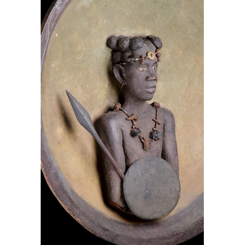 622 - A RARE MADAGASCAN SOUTHERN SAKALAVA PEOPLES PLAQUE EARLY 20TH CENTURYDepicting a warrior with spear ... 