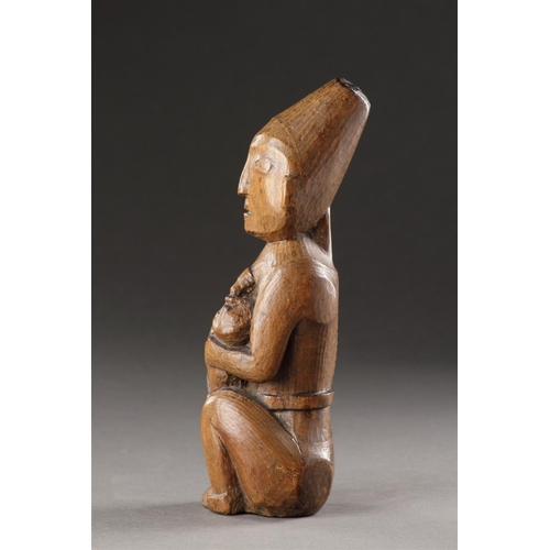 629 - A RARE AND EARLY NORTHWEST COAST CARVED WOOD MATERNITY FIGURE KWAKIUTL (KWAKWAKA 'WAKW'), 19TH CENTU... 