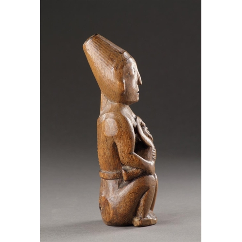 629 - A RARE AND EARLY NORTHWEST COAST CARVED WOOD MATERNITY FIGURE KWAKIUTL (KWAKWAKA 'WAKW'), 19TH CENTU... 