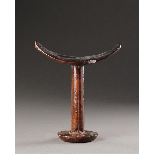 639 - A FINELY CARVED 'BONI' NECK-REST SOMALIA, 19TH CENTURY Dark colour and patination through extended u... 