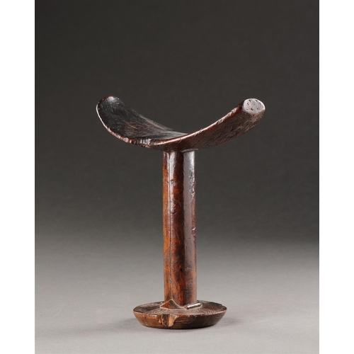 639 - A FINELY CARVED 'BONI' NECK-REST SOMALIA, 19TH CENTURY Dark colour and patination through extended u... 