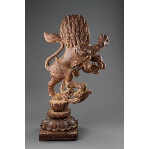 645 - A GOOD PAIR OF ANGLO-INDIAN CARVED WOOD RAMPANT LIONS MID 19TH CENTURY Wood, polychrome, and gilt, b... 