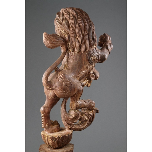 645 - A GOOD PAIR OF ANGLO-INDIAN CARVED WOOD RAMPANT LIONS MID 19TH CENTURY Wood, polychrome, and gilt, b... 