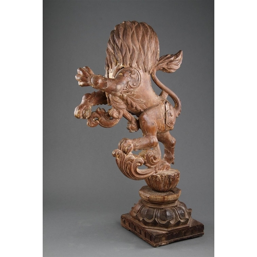 645 - A GOOD PAIR OF ANGLO-INDIAN CARVED WOOD RAMPANT LIONS MID 19TH CENTURY Wood, polychrome, and gilt, b... 