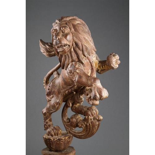 645 - A GOOD PAIR OF ANGLO-INDIAN CARVED WOOD RAMPANT LIONS MID 19TH CENTURY Wood, polychrome, and gilt, b... 