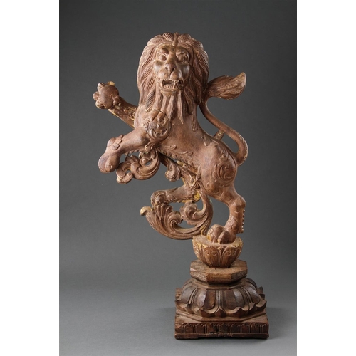 645 - A GOOD PAIR OF ANGLO-INDIAN CARVED WOOD RAMPANT LIONS MID 19TH CENTURY Wood, polychrome, and gilt, b... 