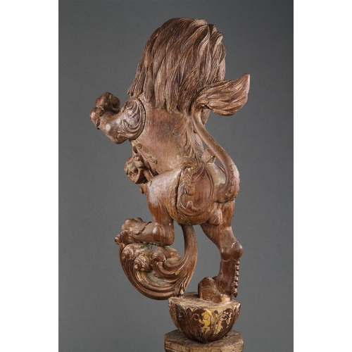 645 - A GOOD PAIR OF ANGLO-INDIAN CARVED WOOD RAMPANT LIONS MID 19TH CENTURY Wood, polychrome, and gilt, b... 