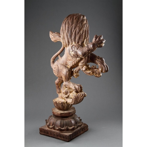 645 - A GOOD PAIR OF ANGLO-INDIAN CARVED WOOD RAMPANT LIONS MID 19TH CENTURY Wood, polychrome, and gilt, b... 