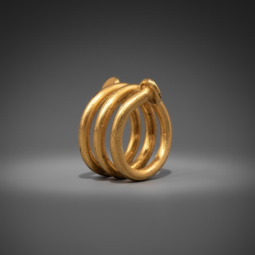 647 - A GOLD RING/HAIR COIL BELIEVED TO BE LATE ROMAN/EARLY CELTIC Size: ring size approximately FGross we... 