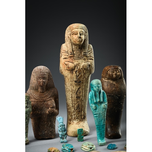 657 - A COLLECTION OF EGYPTIAN WORKS OF ART AFTER THE ANTIQUE TO INCLUDE: Six Egyptian ushabti, largest 16... 