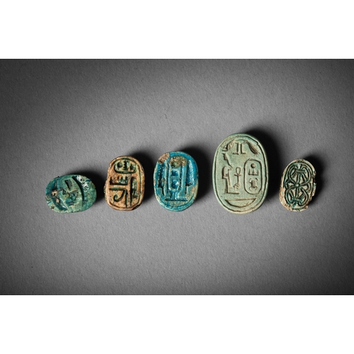 657 - A COLLECTION OF EGYPTIAN WORKS OF ART AFTER THE ANTIQUE TO INCLUDE: Six Egyptian ushabti, largest 16... 